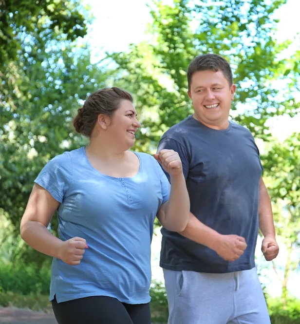 Couple walking happily after weight loss injections